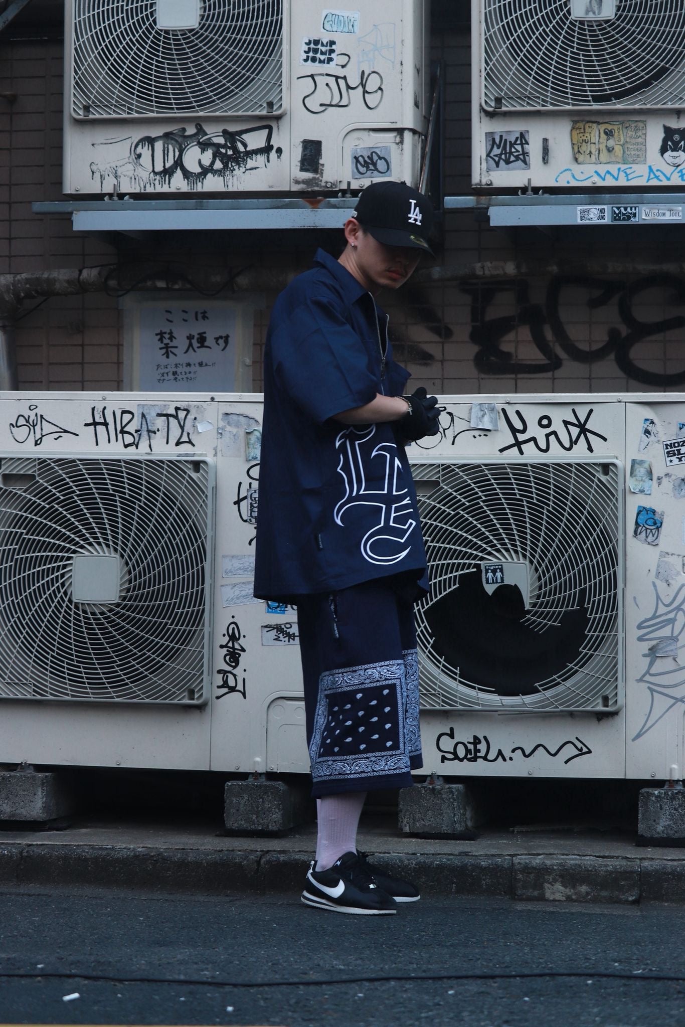Model wearing navy blue bandana outfit from LOWLOW Streetwear in Tokyo Japan